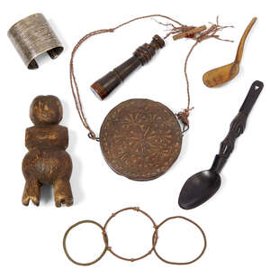 
	
		A collection of African artefacts, 18th-early 20th century, comprising a carved wood...