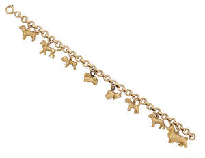 
	
		A charm bracelet, the 9ct gold circular belcher-link bracelet suspending eight 9ct gold...