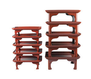 
	
		A set of fifteen red lacquer square trays, 20th century, 36cm wide, with wooden case...