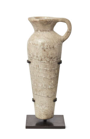 
	
		An Egyptian alabaster vase with handle, Middle Kingdom 2050-1710BC, on stand, 15.9cm....
