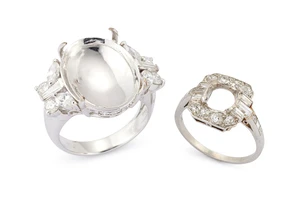 Two diamond set ring mounts, the first signed Hennell, with a vacant cushion shaped collet, an...