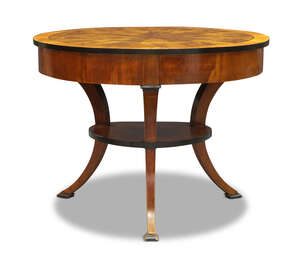 
	
		A Biedermeier flame mahogany, cherrywood and ebony centre table, early 19th century, the...