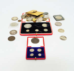 
	
		A 1907 Maundy money set,  in a red and gilt embossed case, together with a George III...