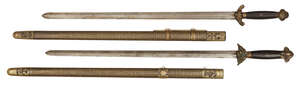 
	
		Two similar Chinese ceremonial swords (jian), 19th century, each with wooden handles,...
