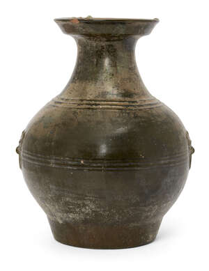 
	
		A Chinese bronze-imitation pottery jar, Hu, Han dynasty style, the sides moulded with...