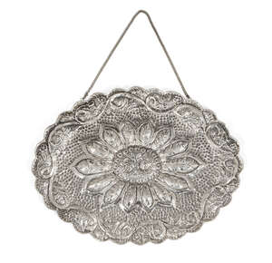 
	
		A large Turkish wedding mirror, unmarked, possibly silver, of shaped oval form, the...