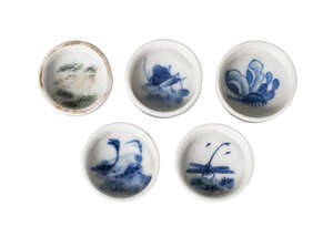 Five Chinese porcelain bird feeders, late Qing dynasty - Republic, four painted in underglaze blue, one painted in enamels with a horse, 4cm diameter (5)