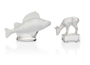 
	
		René Lalique (1860-1945), two clear and frosted glass paper-weights
		Comprising:...