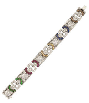 
	
		A diamond and gem panel bracelet, composed of four circular-cut diamond-set rectangular...