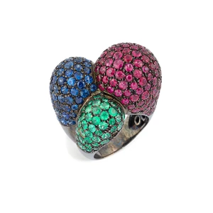 An ruby, emerald and sapphire ring, the head designed as three graduated lobes, pavé set with round rubies, sapphires or emeralds, to tapering plated hoop, st