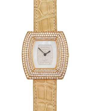 Swiss. A mother of pearl and diamond set wristwatch with stepped tonneau shaped caseSteps, Circa...