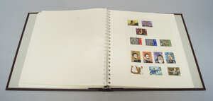
	
		A large collection of World stamps, to include an album entitled The collection of 1990...