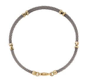 
	
		A flexible bracelet, of bi-colour ropework double-row hinged section design, approximate...