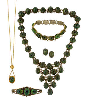 A collection of  Brazilian Tortoise Leaf beetle jewellery, comprising: a necklace; a panel link bracelet; a gilt hinged bangle; earstuds; and single beetle pen