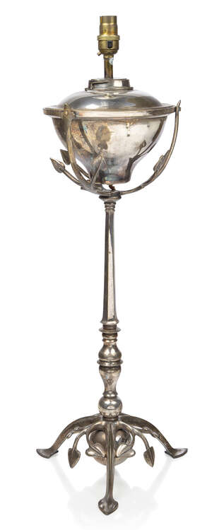 
	
		W.A.S Benson (British 1854-1924), a silvered brass table lamp converted from an oil lamp,...