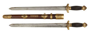 
	
		A Chinese double sword (shuang jian), 19th century, the rosewood sheath with brass mounts...