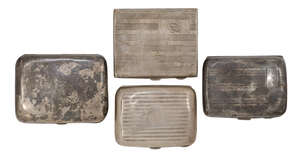 
	
		A group of four silver cigarette cases, all of rounded rectangular form, two of striated...