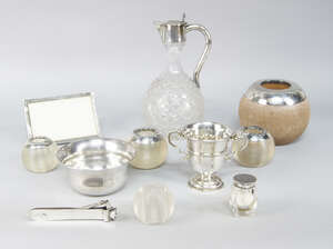 
	
		A late Victorian silver topped cut glass claret jug, London 1899, 24cm high, together...