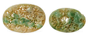 
	
		Two Chinese jadeite oval plaques, mid-20th century, each intricately carved with deisigns...