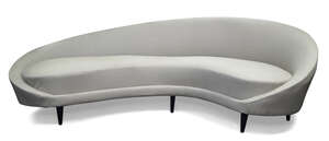 
	
		Italian, a curved sofa in the manner of Ico Parisi  
		Second half 20th Century    
		