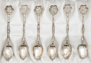 
	
		A cased set of six Chinese silver teaspoons, mid-20th century, with auspicious characters...