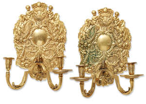 A pair of Dutch gilt-bronze twin-light wall lights, late 19th century, in the 17th century...