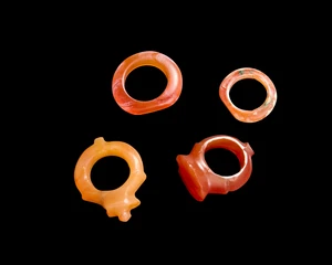 Four carnelian rings,Ancient Near East
Two with raised bevels,
(4)
Provenance: The Private...