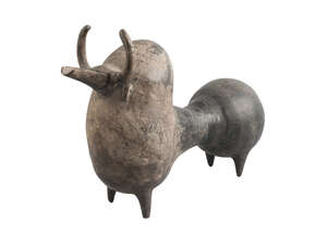 An Amlash-style composite pottery bull rhyton, with prominent rounded neck hump, the muzzle extending into the long spout, with short curving horns, a notched 