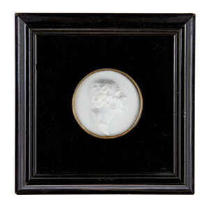 
	
		British School, a white paste portrait relief of a male head, inscribed MILO, according...