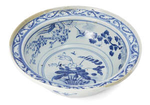 
	
		A Chinese porcelain deep bowl, early 19th century, painted to the central reserve with a...