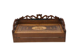 
	
		An Irish yew wood and 'Killarney' marquetry writing slope, third quarter 19th century,...