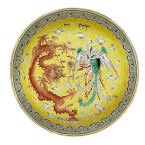 
	
		A Chinese porcelain 'dragon and phoenix' dish, Guangxu mark and of the period, painted in...