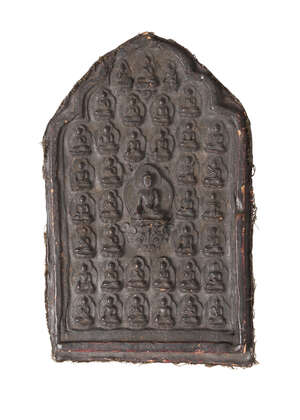 
	
		A large Tibetan terracotta votive plaque, 18th/19th century, depicting Shakyamuni Buddha,...