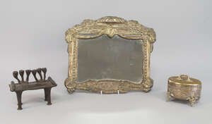 
	
		A Continental pressed metal ecclesiastical frame, 19th century, decorated with scroll and...