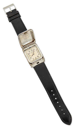 
	
		An early 20th century silver wristwatch by Kendal & Dent, c.1930, the square pop up dial...