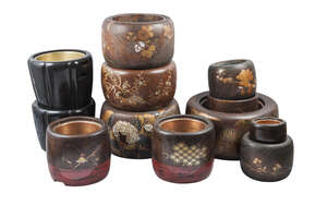 
	
		A collection of Japanese hibachi, 19th and 20th century, comprising nine elm and lacquer...