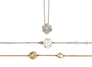 
	
		A diamond flower necklace and two flower bracelets, the necklace with circular cut...