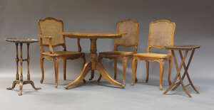 
	
		A George III style mahogany tilt top table, first half 20th Century, the circular top...