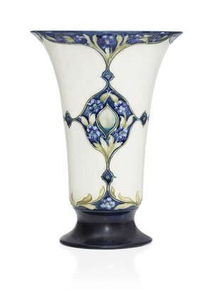 
	
		William Moorcroft (1872-1945), an Forget-Me-Not pattern ceramic vase
		c.1909, signed in...