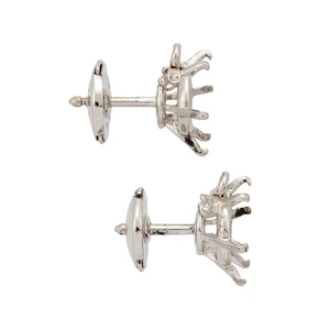 A pair of earring mounts with vacant collet,&nbsp;each designed as a vacant, round, six-claw collet,...