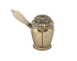 A George IV silver gilt shaving pot, London c.1822, John Linnett, cast with stylized floral decoration to rim and hinged cover, the body with fielded panels an