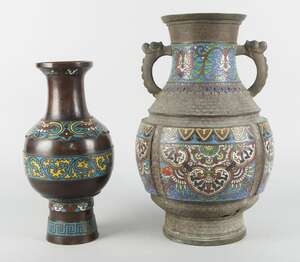 
	
		A Chinese bronze and enamelled twin handle vase, early 20th century, the body moulded...