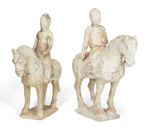 
	
		Two Chinese pottery horses and riders, Tang dynasty, one modelled as a female rider...