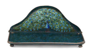 
	
		An Arts & Crafts enamelled metal  Peacock pen tray
		c.1900, apparently unsigned
		