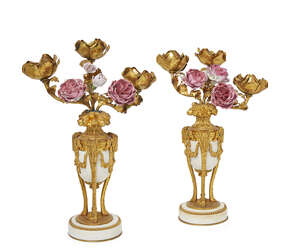 
	
		A pair of French ormolu and white marble three branch candelabra, early/ mid 20th...