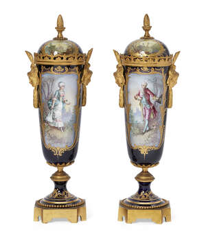 
	
		A pair of French porcelain and gilt metal mounted vases, late 19th century, the lids with...