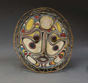 
	
		A Sepik River circular tribal shield, Papua New Guinea, 20th century, the centre...