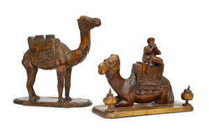 
	
		An olivewood souvenir encrier, late 19th/early 20th century, carved in the form of a...