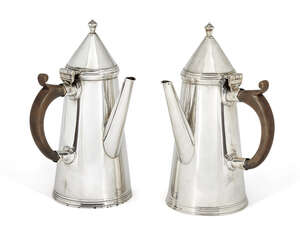 
	
		A pair of side-handled silver café-au-lait pots, Sheffield, c.1922, Thomas Bradbury &...
