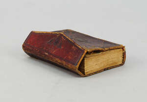 
	
		An Islamic manuscript, 19th century, bound in tooled red leather binding, written in...